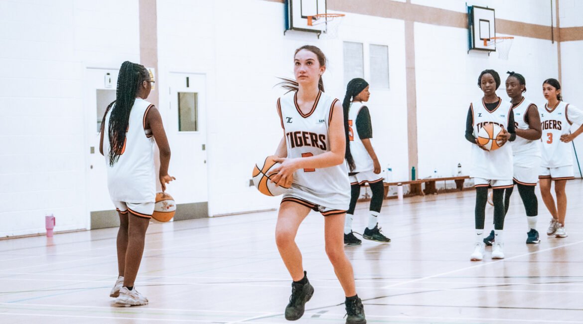 U14 Girls player performing a layup line